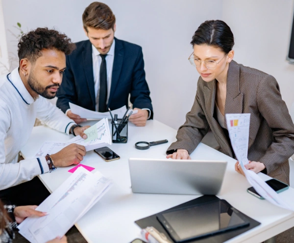 Ecommerce product team collaborating on an online store in a modern office